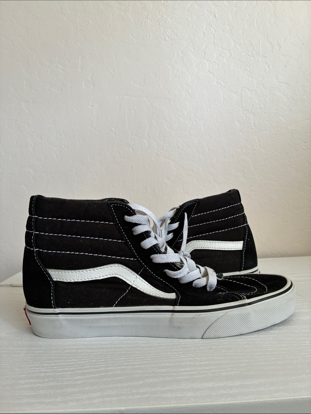 Vans Black and White High-Top Skate Shoe with Gum Sole